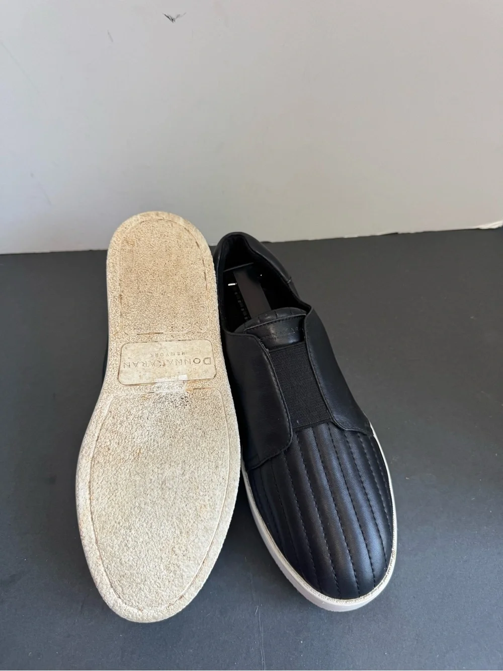Donna Karan New York black leather slip-on sneakers. Size 6